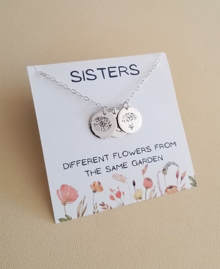 Sisters, different flowers from the same garden A meaningful necklace that represents the birth month of your sisters. Makes a special personalized keepsake gift. Flowers that will last forever ♥Solid disc charms are hand stamped in our studio with a beautiful flower bloom representing the birth month chosen. The circle charm is solid Sterling Silver, 22 gauge not flimsy or bendable and measures 15 mm in size. Charm are displayed from shimmering Sterling Silver chain in your choice of length. Lo Sisters Necklace, Gift Flowers, Birth Flower Necklace, Meaningful Necklace, Flower Charm Necklace, Sister Jewelry, Sister Necklace, Gifts For Your Sister, Get Well Gifts