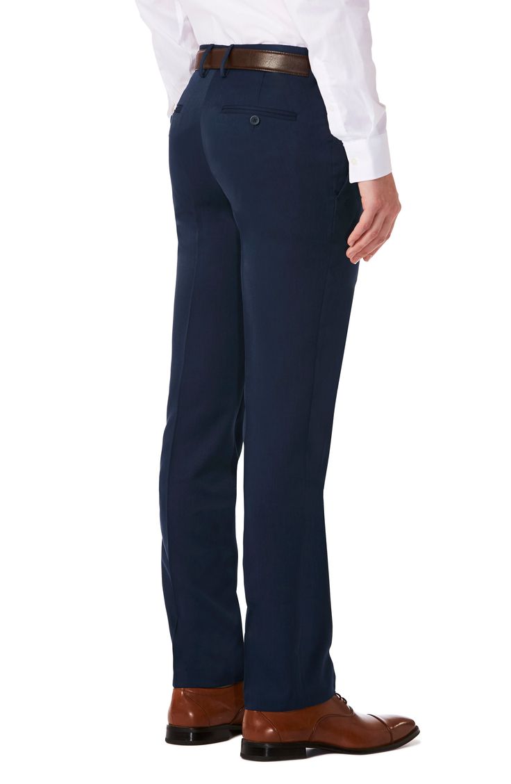 Slim-fit performance dress pants feature a flat front, subtle texture and a signature Rigid Waistband that provides a secure fit on your midsection. The moisture-wicking fabric has the added benefit of eliminating the need to iron making this pant a wardrobe staple. Zip fly with hook-and-bar closure Back besom pockets with button closure 100% polyester Machine wash cold, tumble dry low Imported Navy Fitted Elastane Pants, Navy Fitted Bottoms For Semi-formal Occasions, Navy Fitted Bottoms For Office, Classic Navy Stretch Bottoms, Navy Classic Stretch Bottoms, Navy Fitted Elastane Bottoms, Fitted Navy Dress Pants For Business Casual, Navy Fitted Dress Pants For Work, Navy Fitted Dress Pants For Business Casual