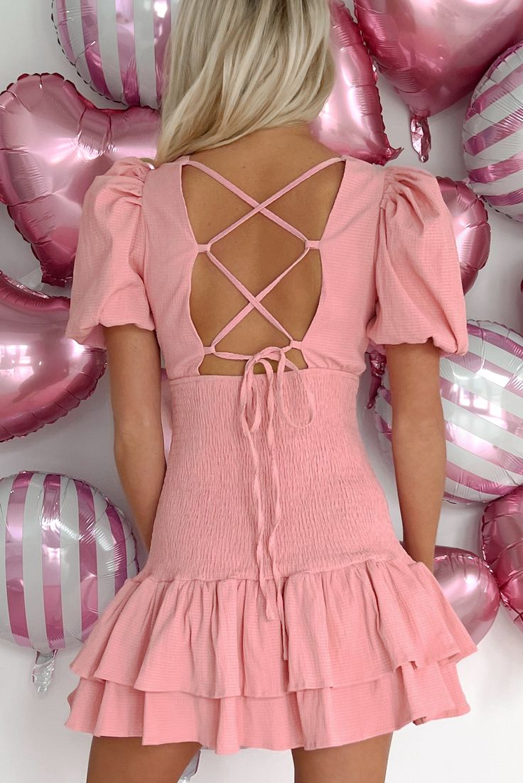 SELF: 56% POLYESTER, 43% COTTON, 1% SPANDEX. LINING: 100% POLYESTER Model Wearing Size Small Color: Baby Pink Textured Material Deep V-Neck Puffed Sleeves Back Lace-Up Detail Smocked Bodice Tiered/Ruffle Hem Mini Length Dress Has Stretch 2.5" Armpit To Sleeve End 23" Armpit To Hemline Video Product Color May Not Be Accurate For Model Size Specs Please Check Size Charts Launched: 12/29/23 Cute Mini Dress With Puff Sleeves And Ruffle Hem, Cute Mini Dress With Tie Back, Cute Puff Sleeve Mini Dress With Ruffle Hem, Cute Mini Length Puff Sleeve Dress With Ruffle Hem, Cute Mini Puff Sleeve Dress With Ruffle Hem, Cute Puff Sleeve Dress With Smocked Bodice For Spring, Cute Puff Sleeve Dress With Smocked Bodice, Spring Cute Puff Sleeve Dress With Smocked Bodice, Cute Puff Sleeve Dress For Brunch