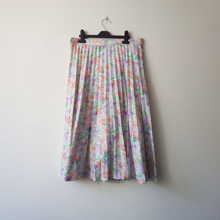 Vintage floral pastel patterned pleated midi skirt, Suisses, size L large - size is estimated - please check the measurements - made in West Germany - 100% polyester - some small stains - see photos - measurements when laid flat- waist: 16 in (40.5 cm), length: 29 in (73 cm) Pastel Pattern, Beautiful Skirts, Pleated Midi Skirt, Vintage Jacket, Vintage Floral, Midi Skirt, Womens Skirt, Pastel, Clothes For Women