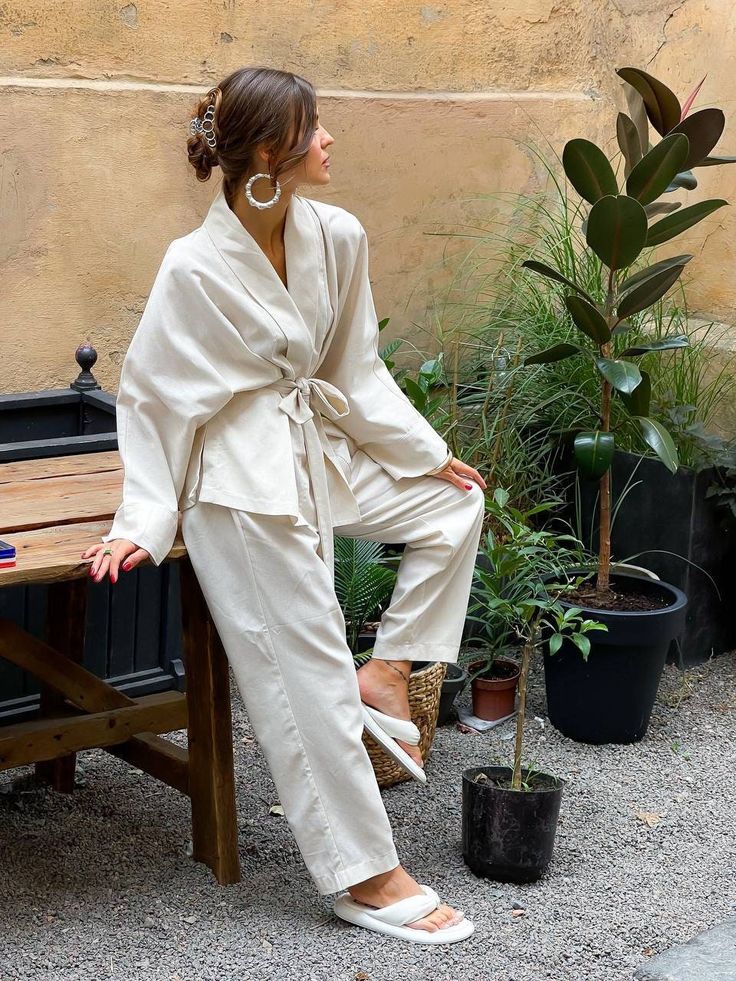 "Milk kimono linen suit is stylish and comfortable. This boho oversized pajama-style suit consists of a two-piece jacket under the belt and trousers. The suit will be suitable for various occasions, both everyday for every day and for special occasions. DETAILS - milk color - linen fabric - loose fit - under the belt SIZES This dress is available in 2 sizes S-M and L-XL S-M bust 38.6\"/ 98 cm waist 28\"/ 72 cm hips 38.6\"/ 98 cm L-XL bust 43\"/ 110 cm waist 34.65\"/ 88 cm hips 45\"/ 115 cm More Linen Holiday Outfits, Kimono Suit Woman, Linen Two Piece, Beige Sets For Spring Daywear, Casual Beige Kimono For Loungewear, Oversized Chic Kimono For Loungewear, Casual Linen Kimono For Loungewear, Bohemian Linen Sets For Spring, Linen Sets For Spring Daywear