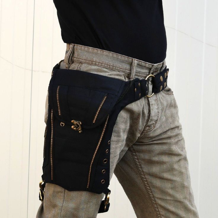 "━━ ━━ Multi-pocket belt 3 in 1, which can be used as a belt, or a shoulder bag, and with or without the leg strap. The Spacebelt has 3 pockets in the front, and one in the back, which close with a zip. The main accessory to party, ride your motorbike, to travel or to enjoy life in total freedom! All our belts are handcrafted with care ♥ ━━ ━━ ♦ UNISEX ♦ FABRIC: cotton and brass ♦ COLOR: black ♦ SIZE: one size fits all from S to XXL. Belt length from 82 to 119 cm / 32.25\" to 47\" ♦ POCKETS appr Urban Bags, Steampunk Pendant, Utility Bag, Leg Belt, Waist Pouch, Utility Belt, Pocket Belt, Hip Bag, 3 In 1