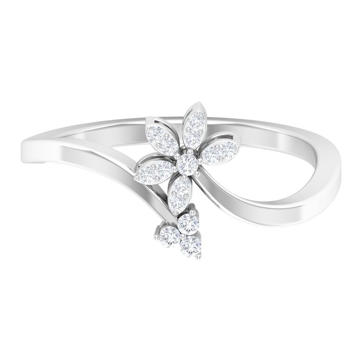 Product Details It is a Flower Shape Ring for Women, set in Gold and features Round Cut Diamonds embellished in Prong Setting with curved shank. It is known as a Floral Ring, for you to look exceptional in the party. Product Information SKU SHP-RINGS122041799 Width 9.5 mm Height 3.5 mm Weight 1.92 gm (Approximate) DIAMOND INFORMATION No.of Stones 14 Pieces Total Weight 0.15 Carat (Approximate) Dimension(approx) Round-1.10X1.10 mm-10 PcsRound-1.40X1.40 mm-4 Pcs Color HI Cut Brilliant Shape Round White Flower Shaped Rings With Diamond Accents, White Diamond Flower Ring For Formal Occasions, White Flower Shaped Diamond Ring For Formal Occasions, White Flower Diamond Ring For Formal Occasions, Formal White Flower Shaped Diamond Ring, Floral Ring, 18k Yellow Gold Ring, Women Set, Ring For Women