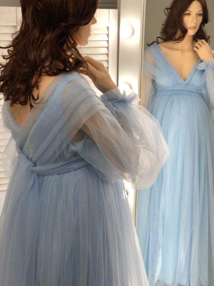 Maternity Fitted Tulle Dress, Blue Empire Waist Wedding Dress, Blue Tulle Maternity Gown, Blue Long Sleeve Maternity Dress For Wedding, Blue Fitted Maternity Dress For Wedding, Light Blue Fitted Maternity Maxi Dress, Elegant Fitted Tulle Maternity Dress, Elegant Blue Floor-length Maternity Dress, Elegant Blue Maxi Maternity Dress