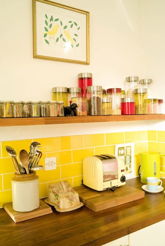 the kitchen counter is covered with various items