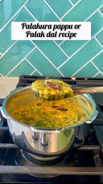 a pot full of food sitting on top of a stove