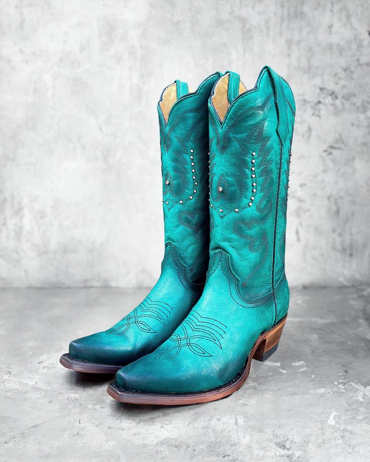 These are the best quality handmade leather boots from Leon, Mexico. All our cowboy boots are made with the finest leather and have a super comfortable outsole. Perfect for special ocasions and everyday wear. Features: -Color: Turquoise COWBOY BOOTS -Toe: Features a snip toe -Genuine Leather Lining -Genuine Leather Insole -Genuine Leather outsole Western Turquoise Boots With Patina, Turquoise Western Boots With Patina, Western Blue Leather Heeled Boots, Western Style Blue Leather Heeled Boots, Blue Leather Western Heeled Boots, Western Turquoise Boots For Rodeo, Western Turquoise Boots For Fall, Turquoise Western Boots For Ranch, Fitted Turquoise Boots For Ranch