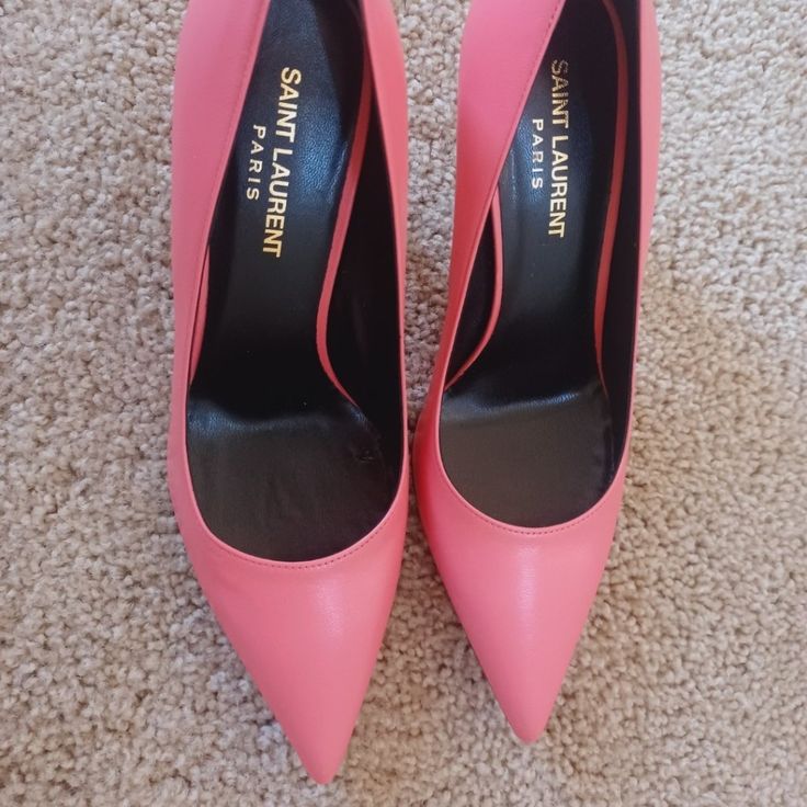 Saint Laurent Women's Coral Pink Leather Tripon Paris Pump 375366 6618 Made Of Leather; Leather Sole; Leather Lining; Toe Style: Pointed; Heel Type: Stiletto; Measurements: Heel: 4.25; Width: Medium (B, M); Original Ysl Saint Laurent Box, Tags, And Authenticity Card Included; Made In Italy Chic Pink Closed Toe Court Shoes, Luxury Pink Heels For Office, Luxury Pink Heels For The Office, Pink Formal Court Shoes Medium Width, Pink Medium Width Court Shoes For Formal Occasions, Pink Pointed Toe Court Shoes With Padded Heel, Pink Round Toe Court Shoes For Work, Pink Pointed Toe Court Shoes For Work, Pink Padded Heel Court Shoes For Office