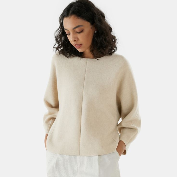 Sally Merino Wool Sweater in Cream Ivory | Women's Sustainable and Stylish Knitwears | VIVAIA Chic Cream Sweater With Ribbed Cuffs, Oversized Fine Knit Beige Sweater, Chic Cream Soft Knit Cropped Sweater, Elegant Crew Neck Cropped Sweater For Winter, Chic Fine Knit Cropped Sweater, Beige Wool Sweater With Relaxed Fit, Chic Sweater With Relaxed Fit And Batwing Sleeve, Chic Sweater With Batwing Sleeves Relaxed Fit, Modern Beige Sweater For Workwear