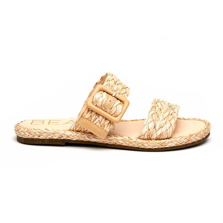 Slip on sandals with a cute, coastal vibe. Trendy Adjustable Sandals With Woven Sole, Trendy Sandals With Woven Sole And Adjustable Fit, Trendy Natural Straw Sandals, Beige Footbed Sandals With Buckle Closure For Vacation, Closed Toe Footbed Sandals With Buckle For Vacation, Beige Sandals With Buckle Closure For Vacation, Beige Buckle Closure Sandals For Vacation, Casual Adjustable Flip Flops For Vacation, Beige Beach Sandals With Buckle Closure