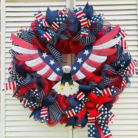 a patriotic wreath with an eagle and stars on it