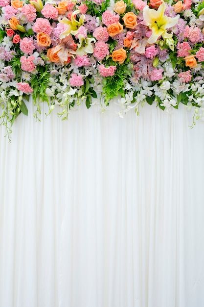 a white backdrop with pink and orange flowers on it, along with the words personalized backdrops for photography