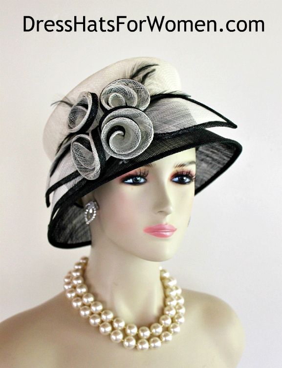 Ladies Black Ivory Mix Sinamay Straw Designer Fashion Wedding Church Hat. This Dress Hat Is Suited For Weddings, Formals, Bridal, Mother Of The Bride, The Kentucky Derby And Horse Races.

Measurements: Crown Measures 22.5".  This lovely headpiece is suited for Spring, Summer or Early Fall.

All Sales Are Final. Fitted White Hats For Weddings, White Fitted Hat For Wedding, White Short Brim Hat For Wedding, White Short Brim Wedding Hat, White Hat For Royal Ascot Ceremony, White Cloche Hat With Short Brim For Wedding, White Short Brim Cloche Hat For Weddings, White Cloche Hat With Curved Brim For Wedding, White Brimmed Cloche Hat For Wedding