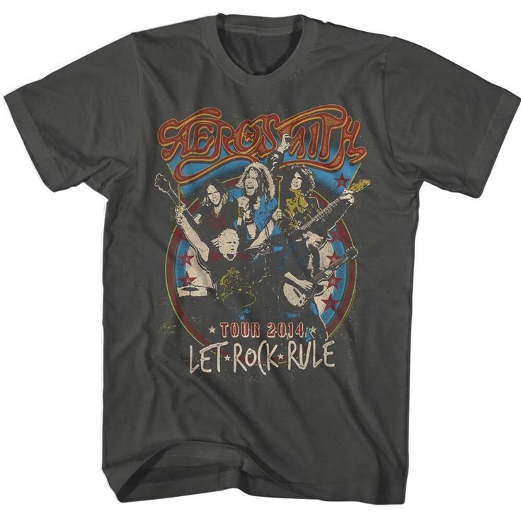 "*Officially Licensed by American Classics* Rock the stage with this officially licensed Aerosmith t-shirt, commemorating their electrifying 2014 tour, \"Let Rock Rule.\" Embrace the legendary band's iconic style as you don this vibrant tee, showcasing the band's name in bold lettering and a dynamic stage design that captures the essence of their epic performances. Whether you're a die-hard Aerosmith fan or simply admire their timeless rock anthems, this shirt is a must-have addition to your col Rock Style T-shirt With Band Logo For Music Festivals, Rock And Roll Band Logo T-shirt For Fans, Rock And Roll Band Logo T-shirt For Music Festivals, Rock And Roll Band Logo T-shirt For Streetwear, Rock Band Logo T-shirt Fan Merchandise, Rock Band Logo T-shirt For Fans, Rock Style Tops With Band Logo For Fans, Rock Style Tops With Band Logo, Rock And Roll Band Logo T-shirt For Concerts