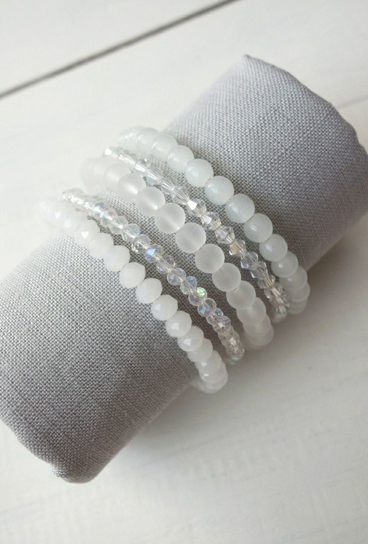 Layered statement bracelet white glass beads Bicone Bead Bracelets, Cheap White Summer Beaded Bracelets, White Bracelets Beaded, Cheap White Hand-wrapped Beaded Bracelets, Glass Bead Charm Bracelet, White Bead Bracelet Ideas, Crystal Beaded Bracelets Diy, Bracelet Stack Beaded, Bead Bracelet Stack Ideas