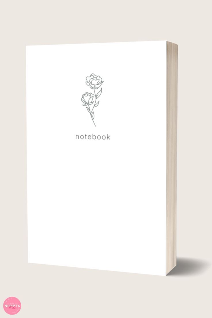 a white notebook with a flower on the front and back cover that reads, notebook