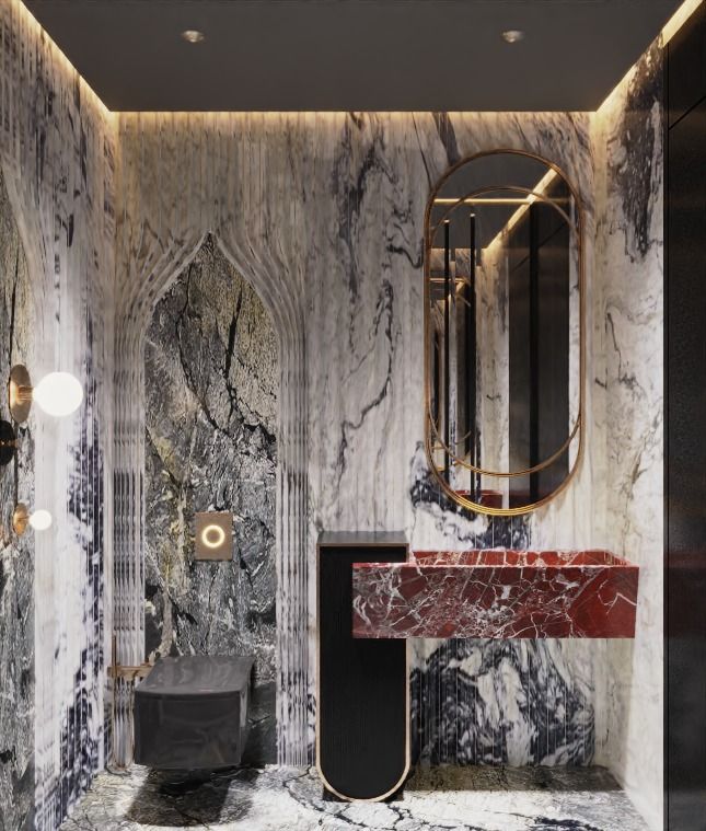 a bathroom with marble walls and flooring in black, white, and gold colors