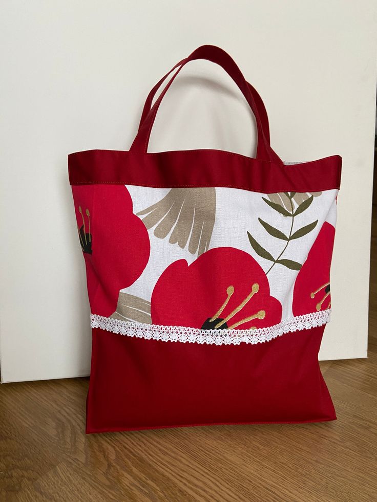 "Tote bag is made with cotton canvas fabric and include handles, perfect for shopping! Market tote bag. Color: red and white Materials: cotton Pattern: red poppies The hand-sewn bag made of 100% cotton is your practical companion for everyday life. A perfect practical gift! Bag Size: Width - 13,5\" (34cm) Height (excluding handles) - 14,5\" (37cm) Depth - 3,5\" (9cm) Plenty of room for A4 books Thank you for visiting!" Red Cotton Canvas Shopping Bag, Red Cotton Canvas Bag For Shopping, Red Cotton Bag For Summer, Summer Red Cotton Canvas Bag, Red Square Canvas Bag For Daily Use, Red Cotton Canvas Bag For Summer, Red Cotton Shoulder Bag For Daily Use, Red Fabric Shoulder Bag For Shopping, White Cotton Beach Bag For Shopping