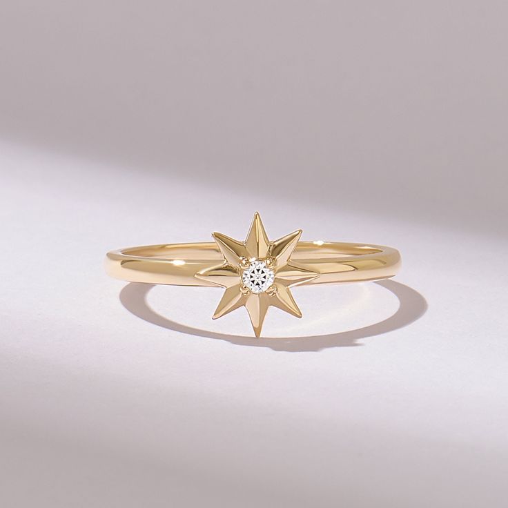 Shine bright with the Diamond 8 Point Star Ring, a stunning statement piece crafted from 14k solid gold. This unique ring features a starburst design that adds celestial elegance to any ensemble. Perfect for daily wear, its dainty yet eye-catching style makes it a must-have accessory for those who love to sparkle and shine. 𝐈𝐭𝐞𝐦 𝐃𝐞𝐭𝐚𝐢𝐥𝐬 * Gold KT: 10K, 14K, 18K * Custom Gold Color: Rose Gold, Yellow Gold, White Gold * Top of Band: 8.05 MM * Width of Band: 1.55MM * Thickness of Band: 1 8 Point Star, Starburst Ring, Celestial Ring, Starburst Design, Gold Statement Ring, Gold Top, Star Ring, Unique Ring, Ring Unique