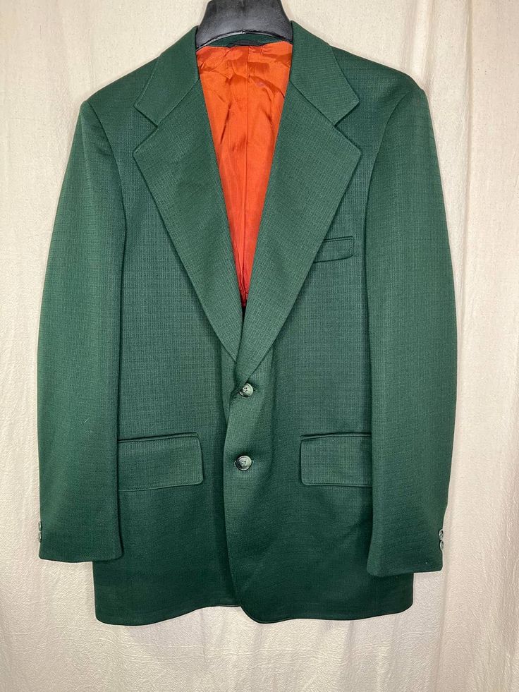 This jacket is in great condition with no stains, tears, or holes. If you have any questions please feel free to ask. Flat Lay Measurements: Chest: 22 inches Shoulder: 18 inches Length: 32 inches Vintage Green Long Sleeve Sport Coat, Classic Green Winter Suits, Green Long Sleeve Sport Coat With Button Closure, Green Semi-formal Winter Sport Coat, Vintage Green Sport Coat For Fall, Green Formal Blazer With Button Closure, Formal Green Blazer With Button Closure, Green Notch Lapel Blazer With Button Closure, Formal Green Sport Coat With Button Closure