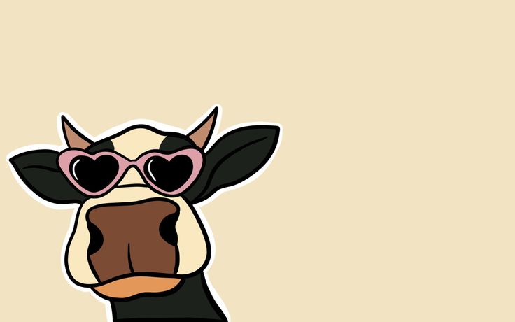 a cow with heart shaped glasses on it's face