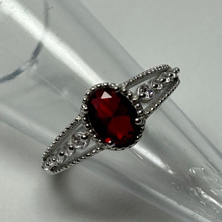 Oval 8x6mm Lab Created Ruby * Sterling Silver * Rhodium Plated * Lead N Nickel Free * Color May Vary. Silver And Ruby Necklace, Victorian Gothic Wedding Ring, Ruby Engagement Ring Aesthetic, Gothic Garnet Engagement Ring, Red And Gold Wedding Rings, Goth Proposal Ideas, Ruby And Silver Engagement Ring, Red And Silver Engagement Ring, Wedding Rings Gothic