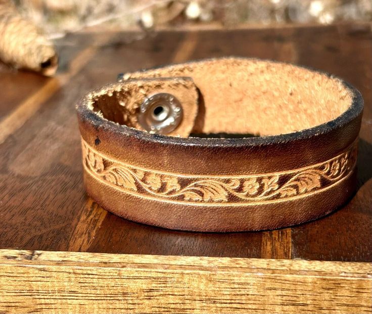 Vintage Embossed Leather Bracelet Bangle Nature Unisex Jewelry 90s 1990s  | eBay Vintage Concho Leather Bracelet For Festival, Vintage Leather Festival Bracelets, Vintage Leather Concho Bracelet For Festival, Vintage Hand-tooled Leather Cuff Bracelet, Vintage Cuff Bracelets With Wrist Strap, Vintage Cuff Bracelet With Wrist Strap, Handmade Vintage Bracelets For Everyday, Adjustable Vintage Cuff Bracelet With Wrist Strap, Vintage Adjustable Leather Bracelet With Concho