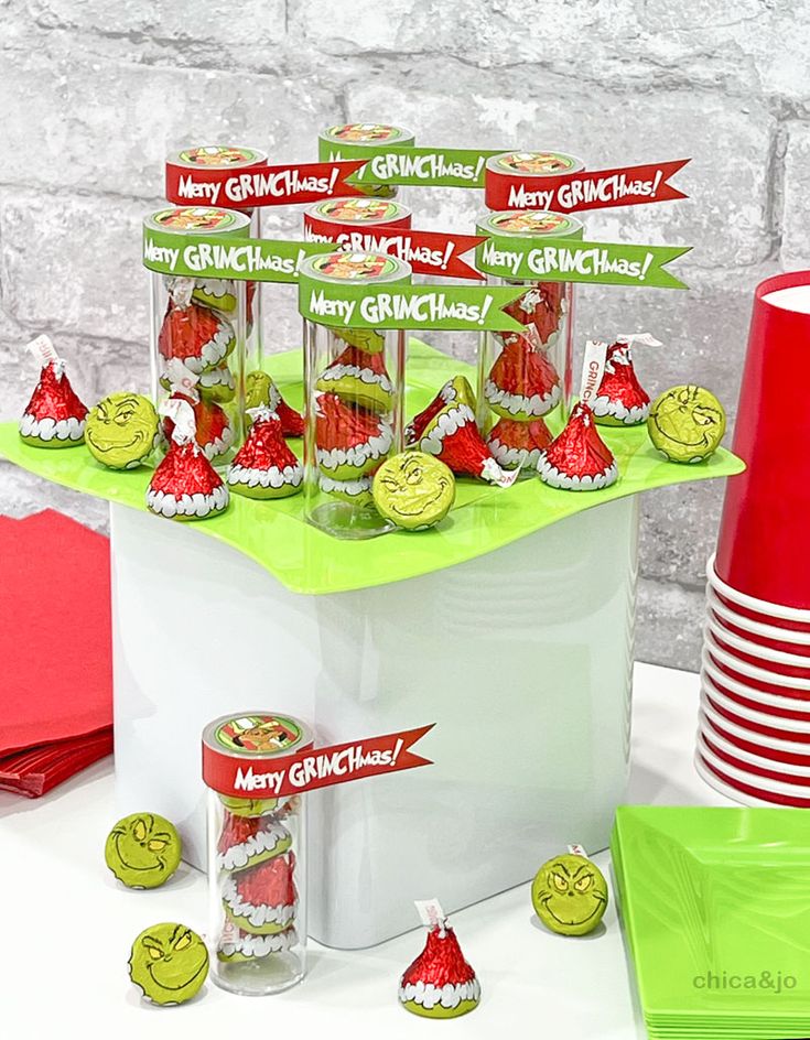 merry grinchmas hershey's kisses are on display at the candy bar