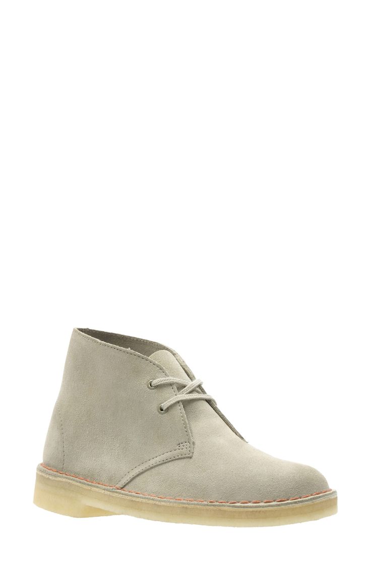 Inspired by the footwear worn by British officers in World War II, this iconic lace-up ankle boot is fashioned from soft suede and grounded by a natural crepe sole for flexible cushioning. 1" heel (size 8.5) 4" shaft Lace-up style Suede upper/leather lining/crepe sole Imported Women's Shoes Suede Lace-up Boots With Rubber Sole And Plain Toe, Casual Suede Lace-up Boots With Leather Sole, Classic High-top Suede Desert Boots, Beige Suede High-top Desert Boots, Beige High-top Suede Desert Boots, Classic Lace-up Boots With Suede Lining, Suede Chukka Boots With Almond Toe And Rubber Sole, High-top Suede Desert Boots With Rubber Sole, Suede Lace-up Desert Boots With Suede Lining