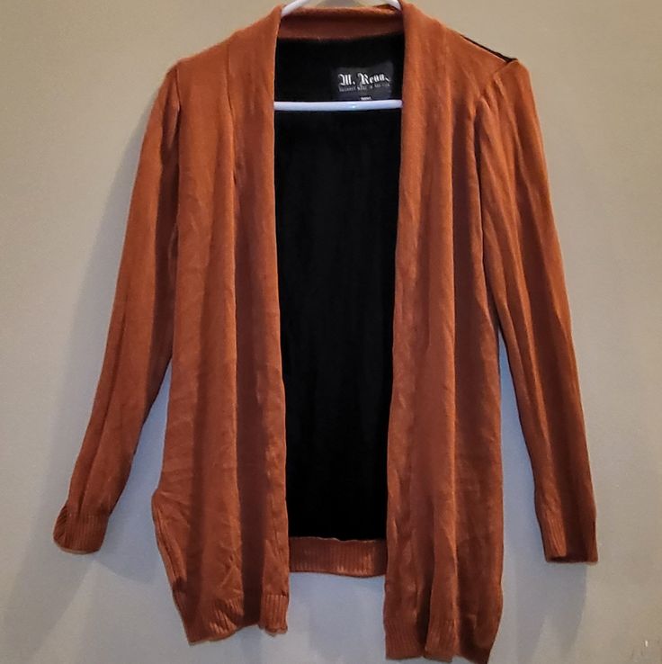 Brand: M. Rena, Size: Small And Medium, Color: Rust And Black, Material: 97% Viscose And 3% Spandex, Condition: Nwot Please Message Me With Any Questions To Assure You Are 100% Satisfied With Your Transaction. Brown Open Front Top For Layering, Casual Brown Open Front Top, Casual Orange Open Front Cardigan, Casual Orange Outerwear For Layering, Orange Open Front Cardigan For Fall, Rust Cardigan, Rust And Black, Orange Black, Sweaters & Cardigans