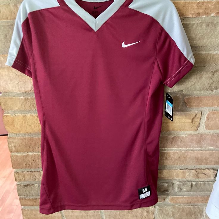 Nwt Nike Shortsleeved Sports Type Pullover Jersey. Burgundy And Gray. Size Medium Sporty V-neck Top For College, Purple Moisture-wicking T-shirt For Sports, Purple Athleisure T-shirt For Sports, Purple Sporty Workout T-shirt, Sporty Purple Workout T-shirt, Collegiate Purple Top For Sports Events, Purple Collegiate Tops For Sports Events, V-neck Tops For College Sports Season, V-neck Sportswear Tops For Workout