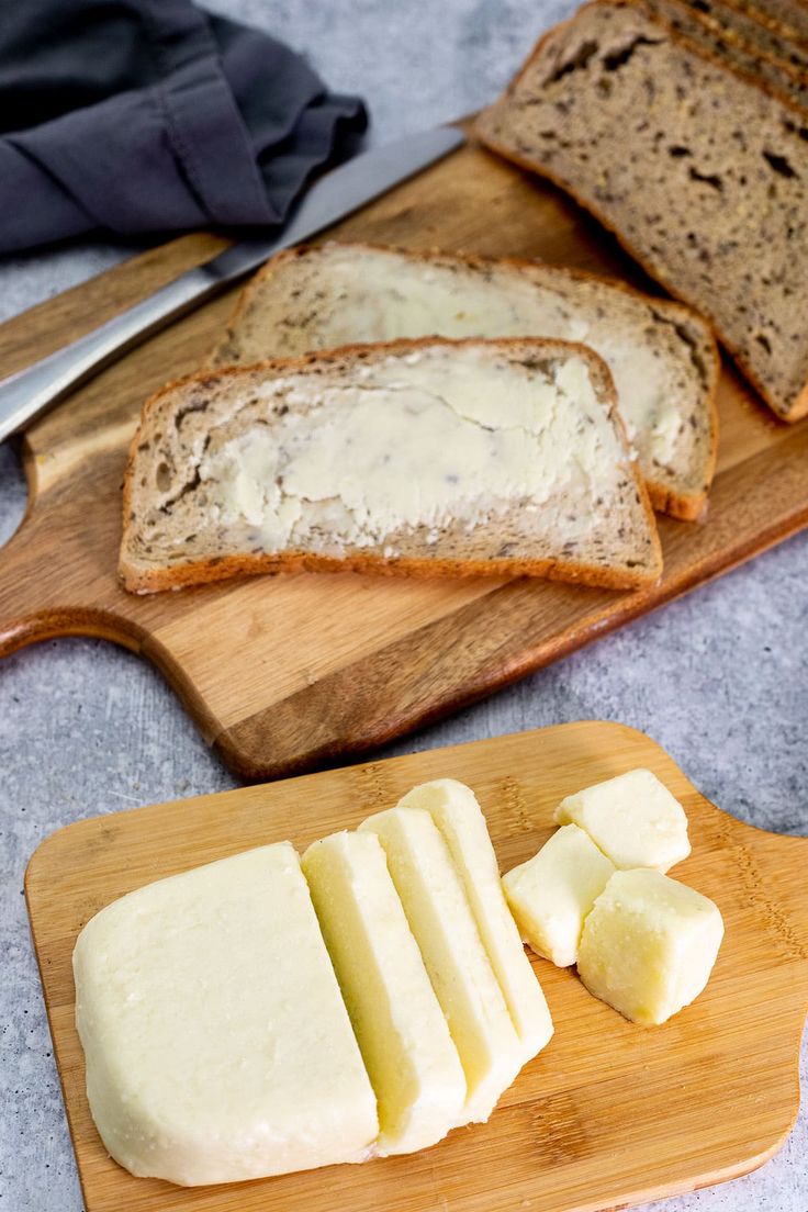 slices of bread and butter on a cutting board