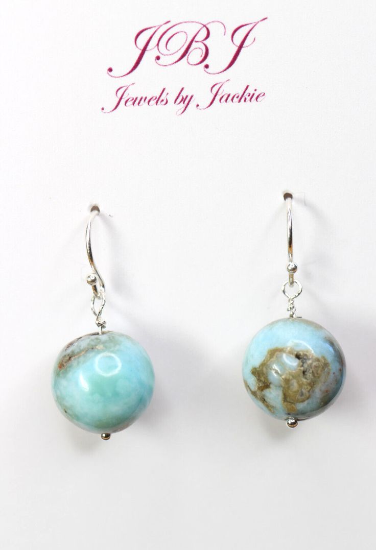 Blue Larimar 12mm Ball Natural Gemstones on .925 Sterling Silver hooks & pins Earrings are 1" long ***Rubber ear stoppers included with each pair*** Items ship via USPS immediately upon receipt of payment Jewels By Jackie founded in 2009 by Jewelry designer Jacqueline Krohmer. Her jewelry is hand crafted, handmade, and sourced responsibly. She takes great care with her customers and welcomes any custom requests for handmade jewelry designs. Most of her art is in .925 Sterling Silver as her preferred metal to work with. We also have copper, silver, brass, and some gold in our inventory. We have over 90 gemstone selections. Shop our Ebay Store JewelsbyJackiecom for new listings daily. All orders ship via USPS package service immediately upon receipt of payment. Store categories: Gemstone Ear Blue Larimar Earrings For Gift, Blue Larimar Dangle Jewelry, Blue Larimar Dangle Earrings, Larimar Round Beads Jewelry For Gifts, Larimar Beaded Jewelry Gift, Larimar Beaded Jewelry For Gifts, Larimar Bead Jewelry For Gifts, Blue Larimar Hypoallergenic Jewelry, Sterling Silver Earrings With Natural Stones