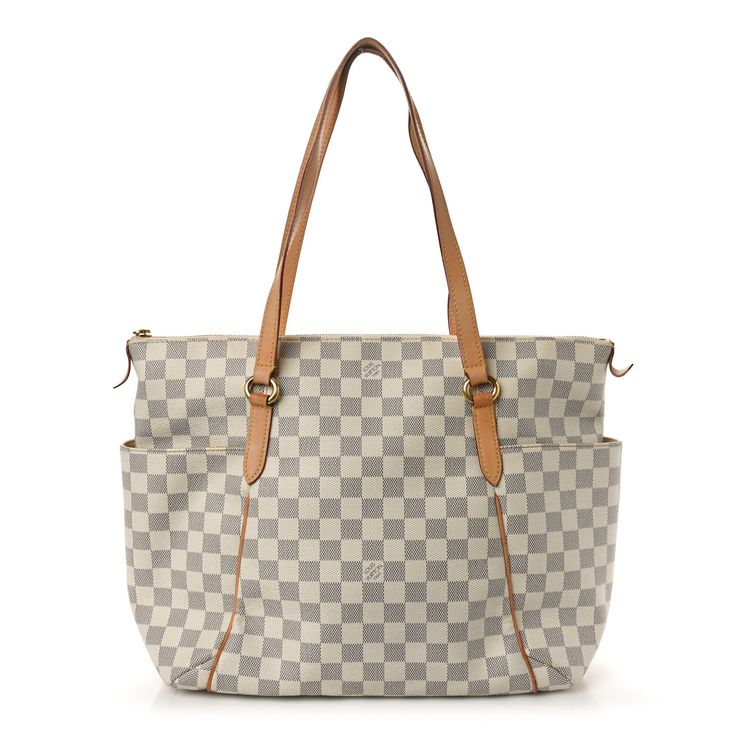 This is an authentic LOUIS VUITTON Damier Azur Totally MM. This stylish tote is crafted of Louis Vuitton signature damier coated canvas in blue and white. The shoulder bag features vachetta cowhide leather shoulder straps, polished brass hardware with bucket pockets on the sides, and opens to a beige fabric interior with patch pockets. Louis Vuitton Empreinte, Louis Vuitton Damier Azur, Beige Fabric, Louis Vuitton Shoulder Bag, Brass Hardware, Polished Brass, Authentic Louis Vuitton, Cowhide Leather, Louis Vuitton Damier