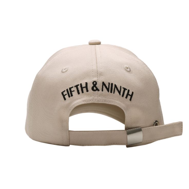 the fifth and ninth hat in beige with black lettering on it, against a white background