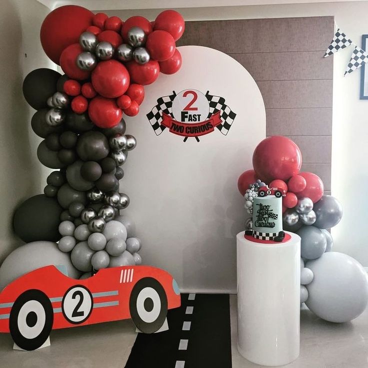 a race car themed birthday party with balloons