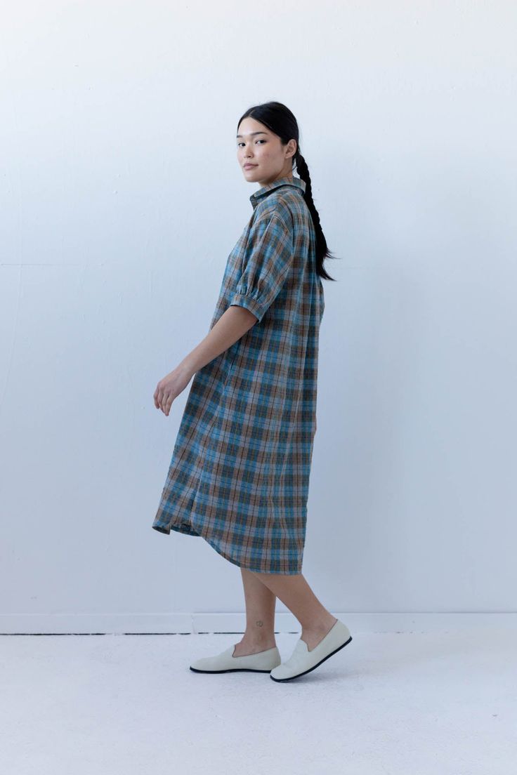 The Arden Shirt Dress is our summer go-to. This easy to wear shirt dress fits loose through the body, with gathers at the back collar and on the elbow length sleeves. In-seam pockets. Model is wearing size SMALL standard length. Model is 5'8". Please review our size guide prior to ordering. Need specific measurements? Send us an email and we will be happy to help you find the perfect fit. Short Sleeve Shirt Dress For Fall Daywear, Oversized Knee-length Dress For Daywear, Oversized Knee-length Day Dress, Spring Daywear Dress With Shirttail Hem, Relaxed Fit Mid-length Daywear Dresses, Oversized Casual Dresses For Daytime, Oversized Casual Daytime Dresses, Spring Dresses With Relaxed Fit And Shirttail Hem, Short Sleeve Relaxed Fit Dresses For Daytime