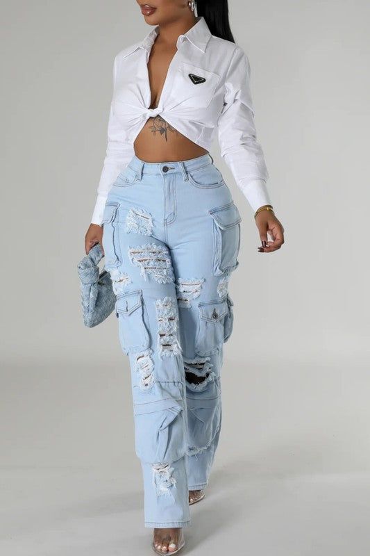 Take on new challenges with our High Rise Multi Pockets Distressed Cargo Jeans! Complete with a high rise waist and multiple pockets, these jeans are perfect for the risk-taker in you. Featuring a distressed design, they add a touch of adventure to any outfit. Ready to conquer the day ahead? These jeans have got you covered. High Rise -Light Blue Washed -Distressed -Multi Pockets -Cargo Jeans -Stretch Denim Fabric Contents 98% COTTON, 2%SPANDEX Ripped Blue Straight Leg Cargo Jeans, Fall Ripped Cargo Jeans, Baggy Ripped Denim Blue Cargo Jeans, Spring Ripped Blue Cargo Jeans, Ripped Straight Leg Dark Wash Cargo Jeans, Dark Wash Ripped Straight Leg Cargo Jeans, Ripped Dark Wash Straight Leg Cargo Jeans, Trendy Ripped Blue Cargo Jeans, Casual High Rise Ripped Cargo Jeans