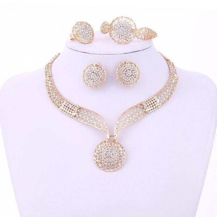 Women Delicate Gold Bridal Jewelry Sets Rhinestone Pendant Collar Bracelet Crystal Earrings Rings Wedding AccessoriesModel Number:32717003424 Plated Round Jewelry Sets For Wedding, Round Plated Jewelry Sets For Party, Plated Round Jewelry Sets For Party, Round Plated Jewelry For Wedding, Plated Round Jewelry For Weddings, Elegant Plated Bridal Sets For Wedding, Elegant Gold Round Bridal Sets, Plated Alloy Jewelry Sets For Wedding, Elegant Alloy Jewelry For Party