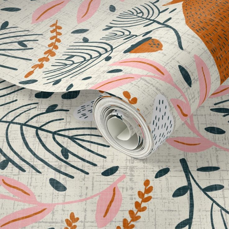 an orange and pink floral wallpaper with leaves on it's side, next to a roll of tape