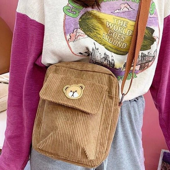 Material: The tote bag is made of soft corduroy on the outer layer and high-quality cotton cloth on the inner layer, which is comfortable and durable, simple and casual. It is a good handbag in life.Size: 7.87" x 6.69" x 1.97", which can satisfy your daily work, leisure and school study.Fashion design: This handbag uses the embroidered bear design, which adds fun to the handbag. It can be used as a casual shoulder bag, university school bag, and work bag. Casual Cotton Shoulder Bag For Fall, Daily Use Corduroy Canvas Bag With Pockets, Corduroy Canvas Bag With Pockets For Daily Use, Casual Corduroy Shoulder Bag For Daily Use, Corduroy Canvas Bag With Pockets For School, School Canvas Corduroy Bag With Pockets, Daily Use Corduroy Canvas Bag, Trendy Cotton Bags For Fall, Trendy Fall Cotton Bags