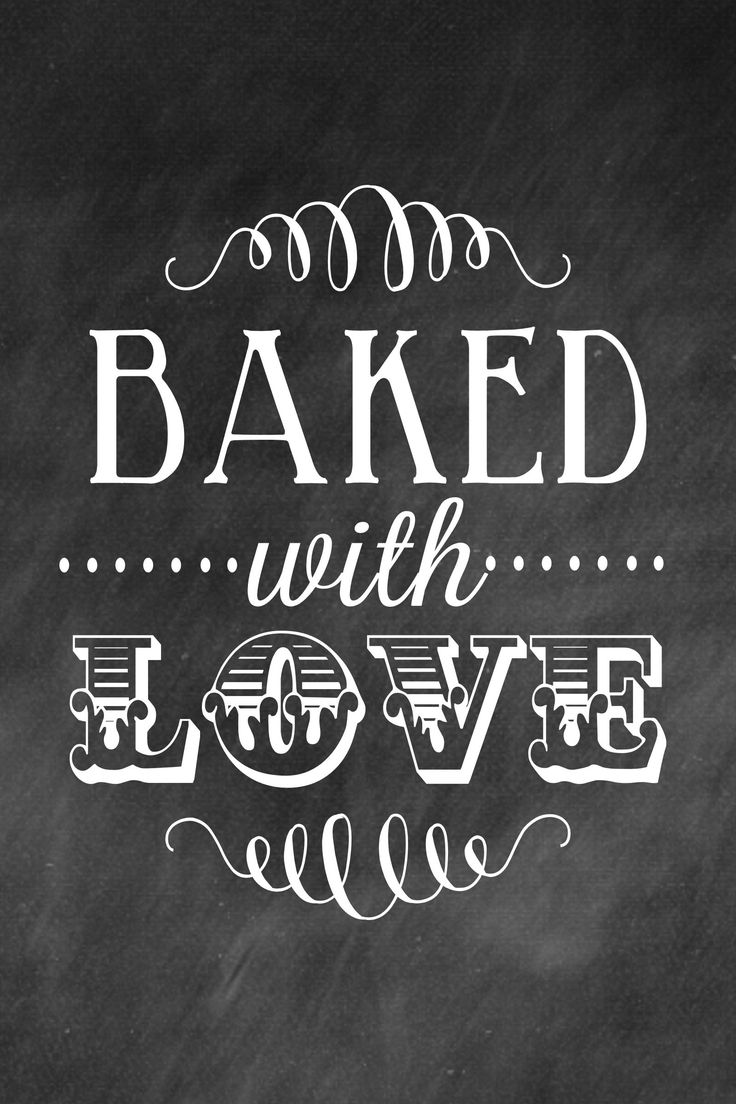 a chalkboard with the words baked with love written in white ink on black paper