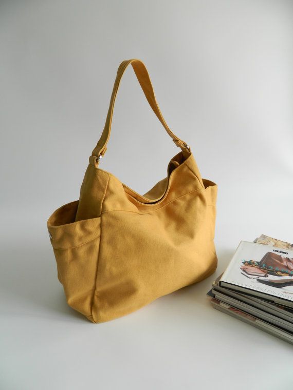 I like this design Everyday Shoulder Weekender Bag With Pockets, Everyday Satchel Bag With Flat Pocket, Versatile Everyday Diaper Bag With Pockets, Yellow Canvas Bag With Pockets For Daily Use, Everyday Hobo Bag With Pockets, Yellow Tote Shoulder Bag With Zipper Pocket, Yellow Shoulder Bag With Zipper Pocket For Everyday Use, Everyday Canvas Satchel Bag With Zipper Pocket, Minimalist Bags For Everyday Use With Flat Pocket