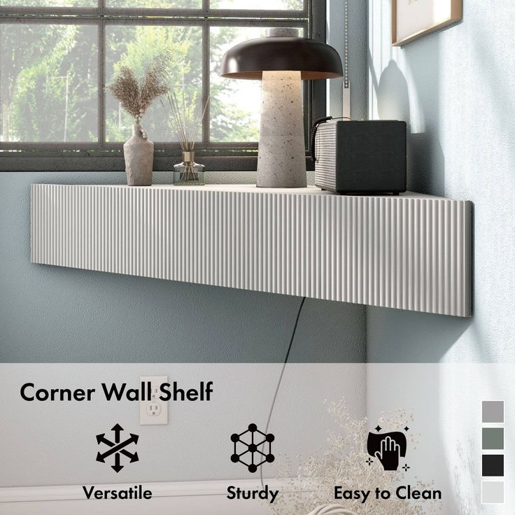 the corner wall shelf is next to a window with an easy to clean light fixture