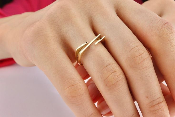 14K Solid Gold Band Ring, Delicate Gold Ring, Fine Stacking Ring, Elegant Band Ring, Gold Elegant Ring These SOLID GOLD Stackable Ring are made entirely from 14K solid gold * Jewelry is packaged and shipped in a delicate jewelry gift box. * If you are purchasing it as a gift, please feel free to add a personal note.   Anniversary, Gift For Wife, Christmas Gift Gold Kt: 14K solid gold * Available Gold Color: Yellow Gold, White Gold, Rose Gold. * Guaranteed Authentic 14k Gold, Not Plated Or Filled * Stamp: 14K Yellow Gold Rings With Unique Design For Wedding, Gold Stackable Rings With Tension Setting, Elegant Rings With Unique Design, Modern Gold Stackable Rings With Tension Setting, Modern Gold Rings With Tension Setting, Modern Gold Ring With Tension Setting, Gold Minimalist Bypass Ring With Polished Finish, Minimalist Yellow Gold Bypass Ring For Formal Occasions, Elegant Stackable Open Band Rings As Gift