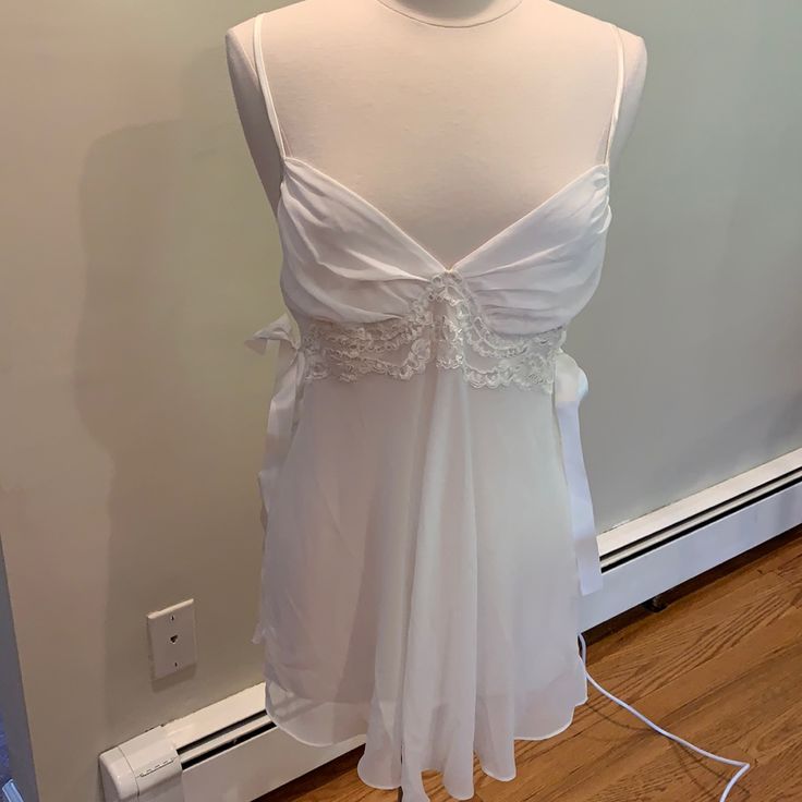 White Chiffon And Lace Night Gown With Satin Bows In Side And Matching Satin Bottoms. Never Worn. Excellent Condition. True To Size Large. Measurements: Side Seam To Side Seam: 15 Inches Shoulders To Hem: 31 Inches Sheer Camisole Wedding Sleepwear, White Sheer Nightgown, Sheer Sleepwear For Wedding Night, Sheer Camisole Sleepwear For Wedding, Sheer Camisole Nightgown For Wedding Night, Sheer White Sleepwear, White Camisole Sleepwear For Wedding, White Coquette Nightgown For Sleep, White Sheer Sleepwear For Night