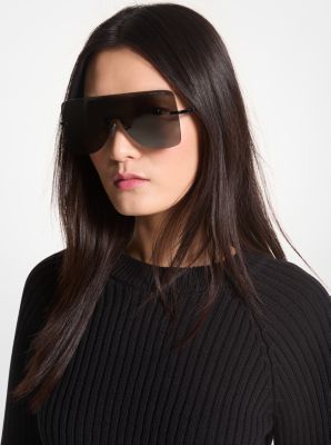 Our London sunglasses epitomize eye-catching style. Featuring oversized frames for an ultra-modern look, these shield-like shades are finished with a subtle “MK” detail on the arms. The lightweight frame feels effortless, but is strong enough to withstand all day wear. Logo Mk, Boxing Day Sale, Convertible Crossbody Bag, Christmas Deals, Michael Kors Collection, Boxing Day, Ultra Modern, Colby, Handbag Shoes