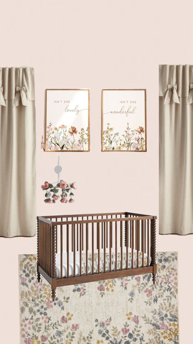 a baby's room with two framed pictures and a crib