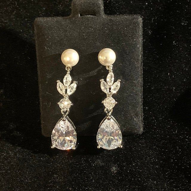 Pearl Bridal Earrings Crystal and Pearl Dangle Earrings | Etsy Elegant Wedding Drop Crystal Earrings, Pearl Drop Dangle Bridal Earrings In Cubic Zirconia, Elegant Drop Earrings For Wedding Reception, Wedding Pearl Chandelier Earrings In Silver, Wedding Chandelier Earrings In Silver With Pearls, Silver Pearl Chandelier Earrings For Wedding, Classic Drop Chandelier Earrings For Wedding, Classic Crystal Bridal Earrings With Pearl Drop, Crystal Bridal Drop Earrings With Pearl Drop