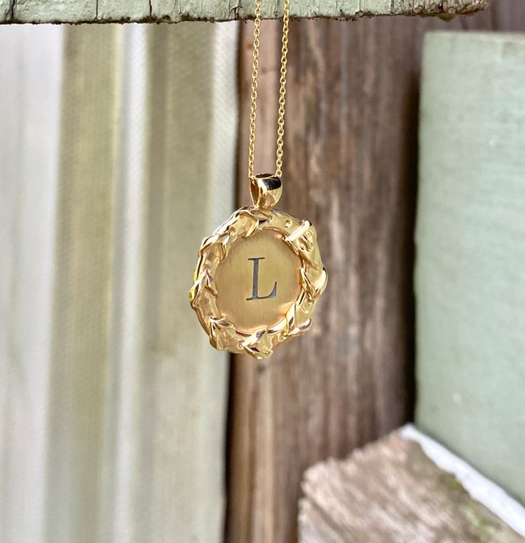 The classic English lace rein & buckle creates a beautiful frame surrounding your initial. Solid 18 karat yellow gold pendant, 20mm in diameter, 18" chain. Contact us to see your own initial. Handmade in the US. Create your own heirloom to wear today! Or surprise someone special in your life. Made to Order. Please allow 6 weeks for delivery. Initial S, Script Initial, Diamond Stacks, Gold Lace, Yellow Gold Pendants, Initial Pendant, Brilliant Diamond, Diamond Bands, Sterling Ring